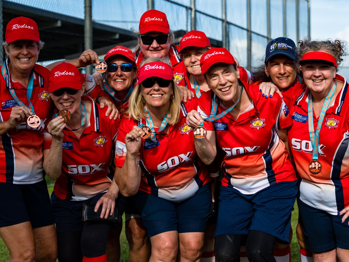 Masters women's softball posing for team photo